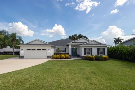 Newer Home on Lake June with Beach, Dock, Screened Patio and Hot Tub!