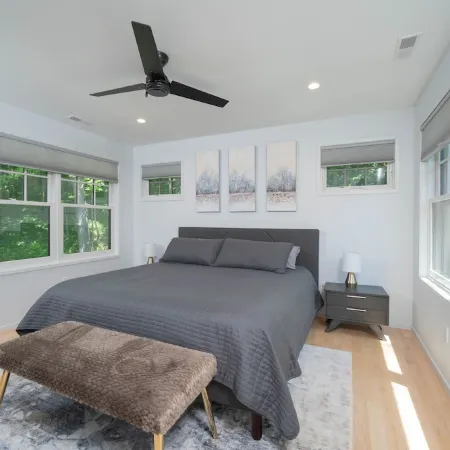 AMAZING NEWER HOME WITH LAKE VIEWS, steps away from shops and restaurants.