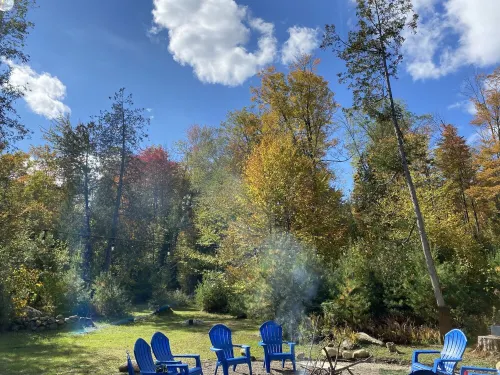 The perfect ADK log cabin getaway on 4 acres and 5 min. to town!