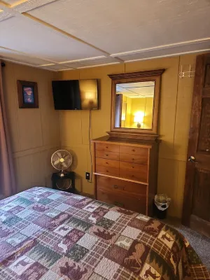 CABIN IN THE WOODS  3-2, Sleeps 8, 10 acres, pet friendly  close to ORV trails! Hotels near Roscommon Zoo