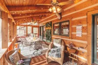 Modern luxury 4 Bedroom cabin with game room, hot tub, sauna and home theater