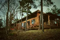 Secluded mountain top cabin with amazing views and hot tub!
