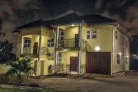 The Moments Guest House Hotels in Abease