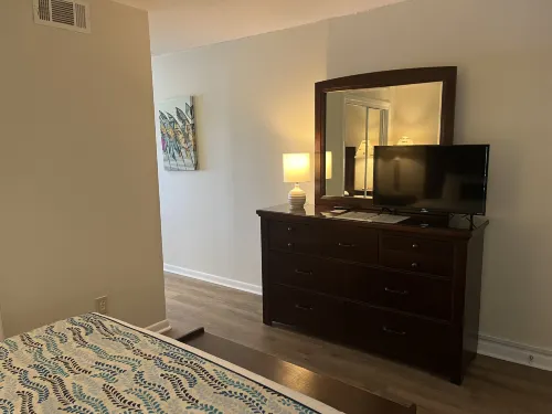 Private Balcony and Modern Kitchenette - Stylish Coastal Escape Hotels in Wrightsville Beach
