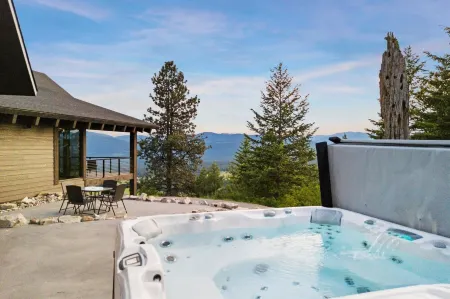 Mountain retreat near Trout Creek MT with hot tub, fire pit and Mountain views
