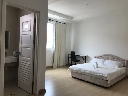 Island Hostel Bayan Lepas Airport Отели рядом с достопримечательностью «Квинс Уотерфронт»