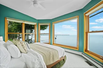 6BR Houghton Lake House w/ Indoor Pool, Hot Tub, and Golf Simulator - Sleeps 24