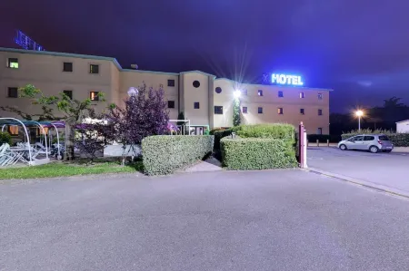 Hotel le Saint Vincent Lyon Sud Отели в г. Шарли