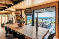 Designer living with stunning views across the bay, a spa and coast walks.