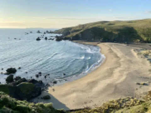 Sky House • Boutique seaside retreat with cinema room and spa