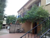 Apartment with balcony upstairs of a villa 300 m from the sea
