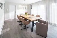 Villa Rosch, WiFi, SKY HD, air-conditioned / ventilation / 4SZ / 2BZ / natural / luxury / Hotels in Norderney