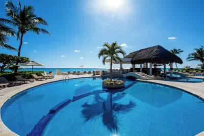 Modern Oceanfront Condo both Gorgeous & Sleek, 2 bds & 2 Bths. Pool w/ Snack Bar Hotels near xcaret