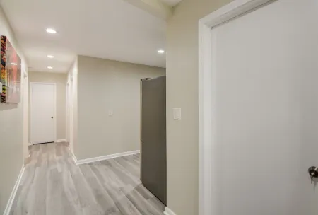 Modern home with 5 bedrooms 2.5 bathroom and  2 full kitchens.