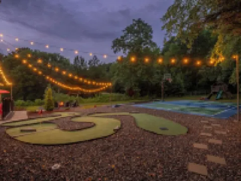 Sleeps 30! Themed Home w/ Pool, Hot Tub, Pond, Pickleball, Putt Putt, Arcades Hotels in Fallstown