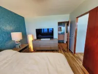 The BEACH PAD- A Beachfront,  Full Ocean View Apartment