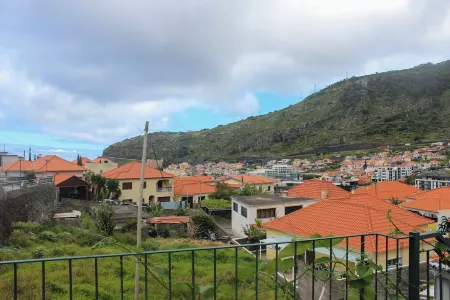 Your retreat between turquoise shores and forested paths Отели в г. Machico