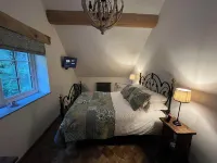 Woodland edge retreat, with wood burning stove.