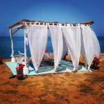 A sunny paradise with a great swimming pool close to the sea.