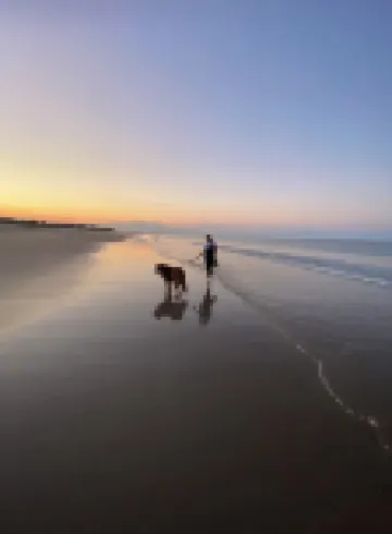 Short walk to the beach! See & hear the ocean in the distance. Great living area