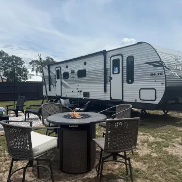 Cozy RV Retreat with Private Hot Tub and Fenced Yard