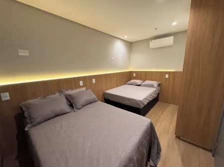 Flats New York Meia Praia Itapema Отели в г. Тижукас