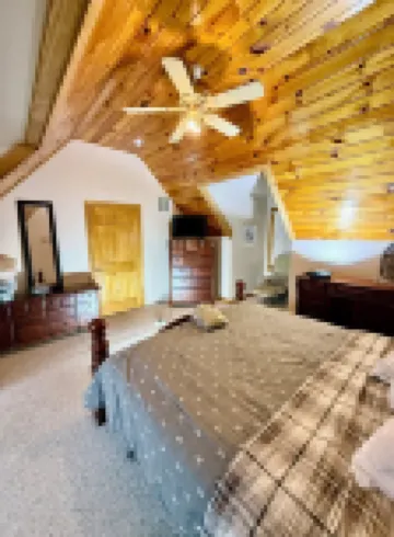 Enchanting 5-Bed/5-Bath Lakefront Log Cabin with Private Cove, Beach & Hot Tub.