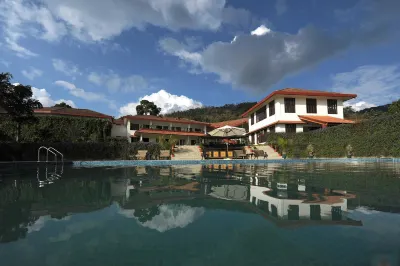 Amritara Ambatty Greens Resort فنادق في Gonikoppal