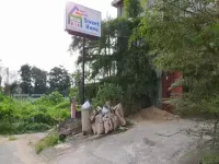 Super OYO 3903 Sweethome Syariah Guesthouse Hotels in Guntung Payung