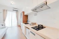 Good Choice Studio at Sky House BSD Apartment By Travelio - Pool