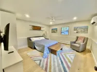 Lakefront cabin with dock, hot tub, fire pit!!