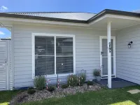 Two bedroom villa with private courtyard, a short walk to Manyana Beach.