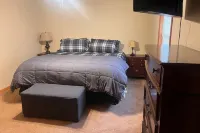 Waterfront house with boathouse, boat launch, outdoor kitchen, fire pit