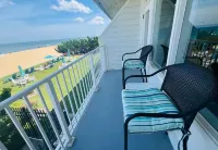VB Oceanfront Condo at Boardwalk. See Dolphins from Balcony. Steps to Beach+Pool Hotel a 