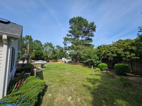 Sam's Place.  NEW LISTING!  Relax in the hot tub after a day of golf!