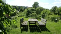 Quietly located holiday home with a natural garden, 500m from the lake and the forest