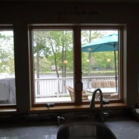 Private 200 feet of lakefront, giant backyard, firepit, canoe, kayaks & more!