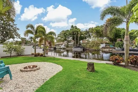 Lakehouse Living w/ Firepit and Boat Dock to relax and Enjoy the Sunset