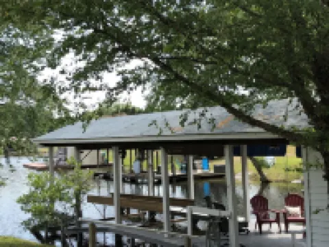 Spacious lakefront home with private boathouse and game room!