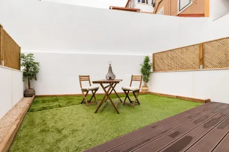 Belem Design 06 by Homing Отели рядом с достопримечательностью «Ajuda Botanical Garden»