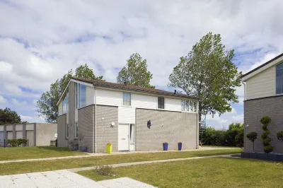Modern Holiday Home with Sauna, in a Holiday Park, Beach Within Walking Distance