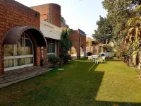Le Green Manor Hoteles en Lahore