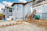 Remodeled partial lake-view home with dock, beach & boat trailer parking