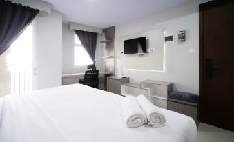 Nice and Comfy Studio at Grand Dharmahusada Lagoon Apartment