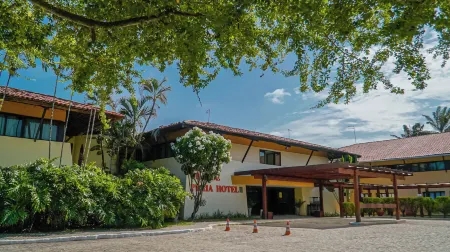 Orange Praia Hotel Отели рядом с достопримечательностью «Coroa do Aviao Beach»