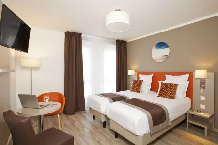 Residhome Paris Rosa Parks Отели рядом с достопримечательностью «Paris Event Center»