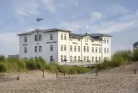 Hotel Am Leuchtturm Отели в г. Варнемюнде