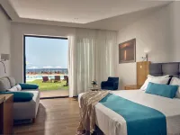 Cavo Orient Beach Hotel & Suites Hôtels à : Arkadii
