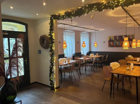 DK Hotel Heidelberg Отели рядом с достопримечательностью «Библиотека Гейдельбергского университета»