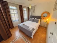 Cunda Palace Hotels near Sevim And Necdet Kent Library